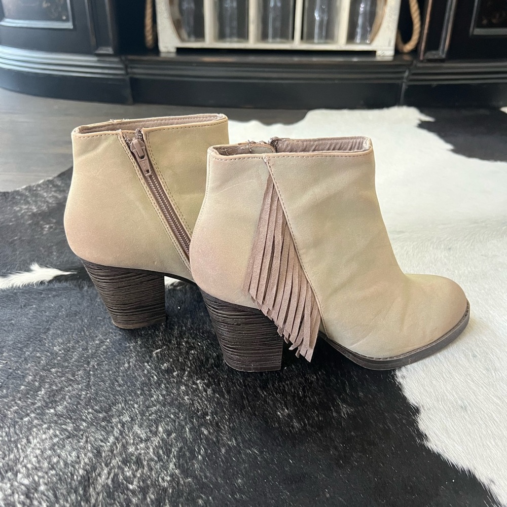 Light tan fringe ankle boots, size 8.